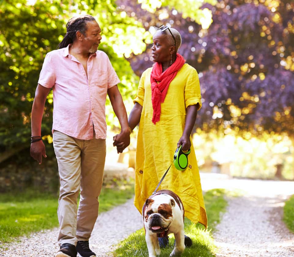 African-American couple walking outdoors